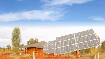 Solar panels, sun energy and electricity generation in desert, Africa.