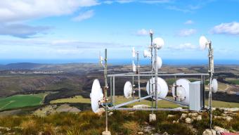 A telecommunication station on top of a mountain peak